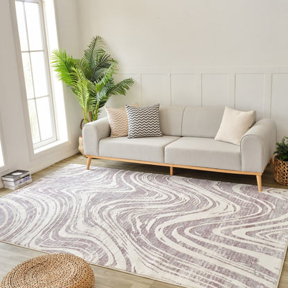7' X 10' Beige and Purple Abstract Distressed Area Rug