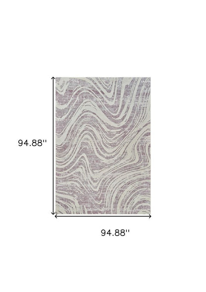 8' X 11' Beige and Purple Abstract Distressed Area Rug