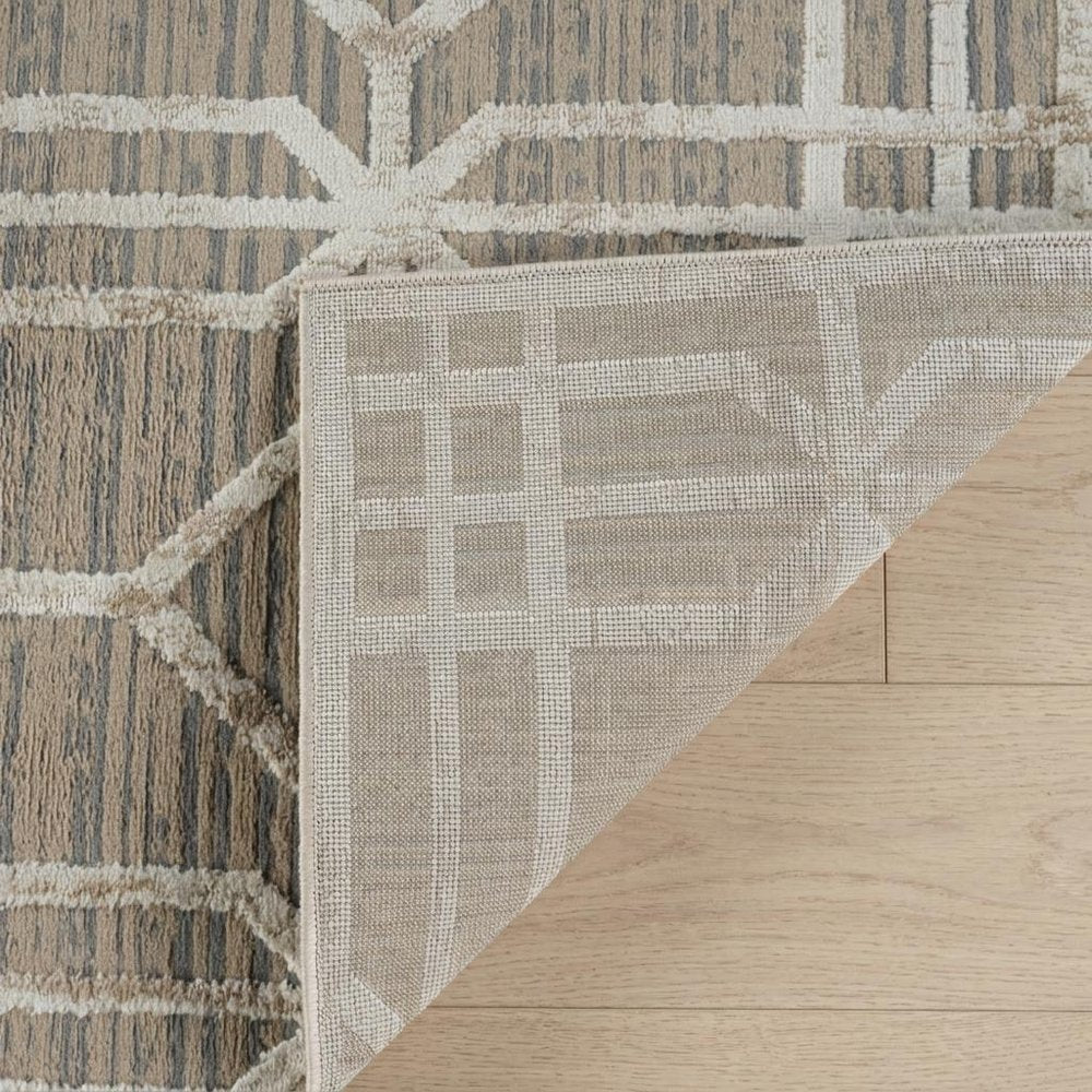 4' X 6' Beige and Brown Abstract Distressed Area Rug