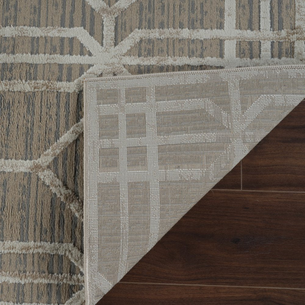 5' X 8' Beige and Brown Abstract Distressed Area Rug