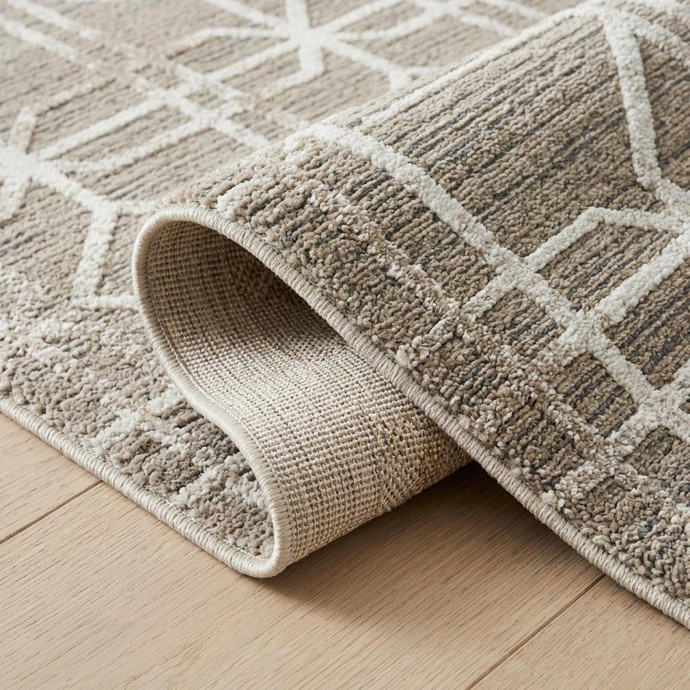 5' X 8' Beige and Brown Abstract Distressed Area Rug
