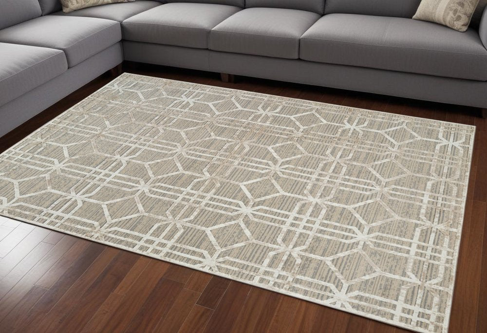 7' X 10' Beige and Brown Abstract Distressed Area Rug