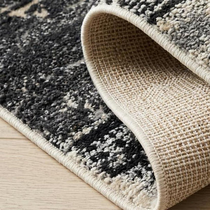 4' X 6' Beige and Black Abstract Distressed Area Rug