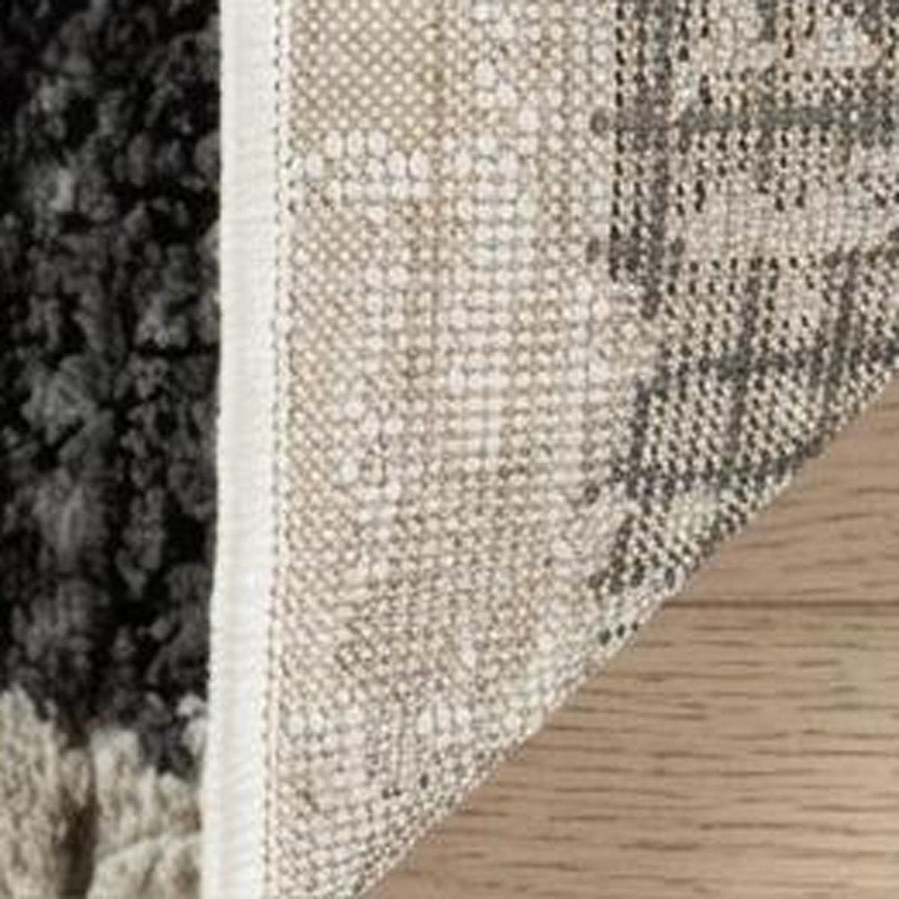 4' X 6' Beige and Black Abstract Distressed Area Rug