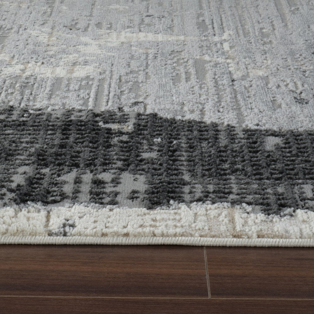 4' X 6' Beige and Black Abstract Distressed Area Rug