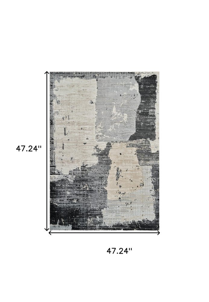 4' X 6' Beige and Black Abstract Distressed Area Rug