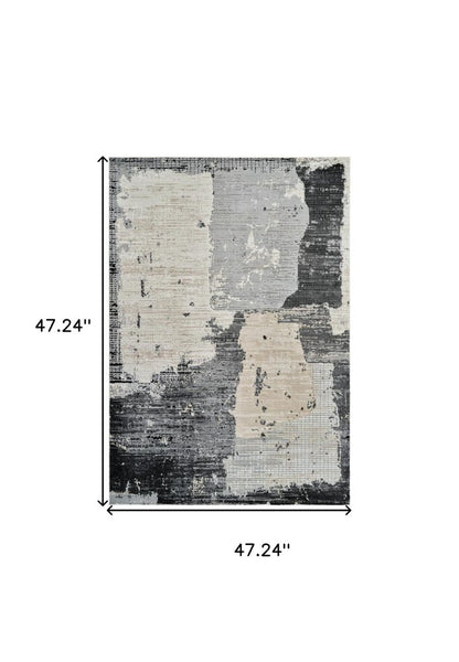 4' X 6' Beige and Black Abstract Distressed Area Rug