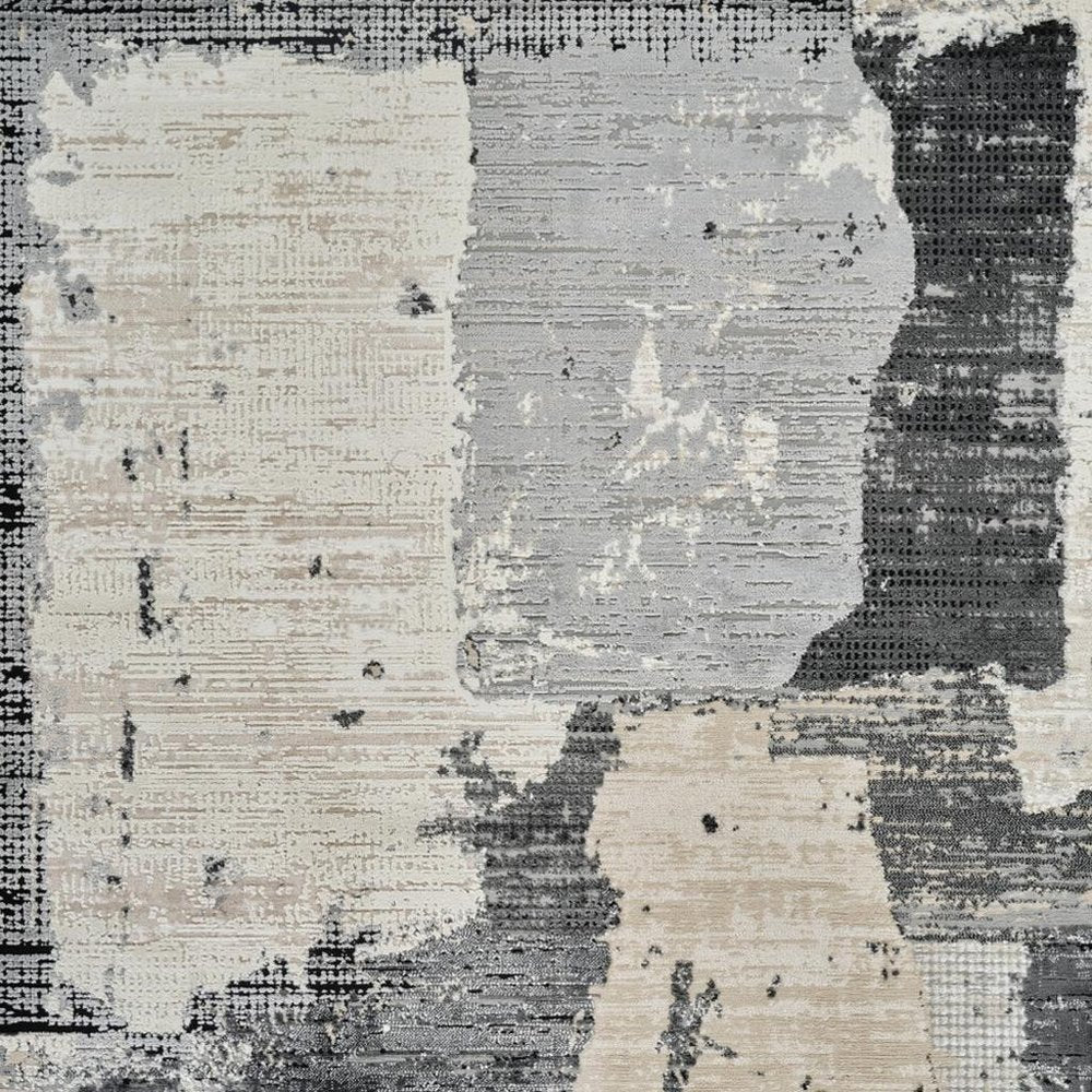 5' X 8' Beige and Black Abstract Distressed Area Rug