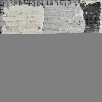 5' X 8' Beige and Black Abstract Distressed Area Rug