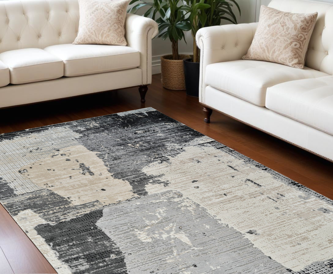 7' X 10' Beige and Black Abstract Distressed Area Rug