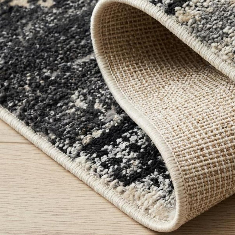 8' X 11' Beige and Black Abstract Distressed Area Rug