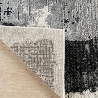 8' X 11' Beige and Black Abstract Distressed Area Rug