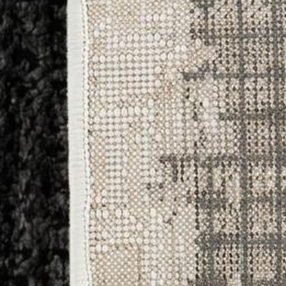 8' X 11' Beige and Black Abstract Distressed Area Rug