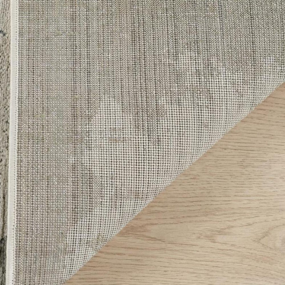 4' X 6' Beige and Green Abstract Distressed Area Rug