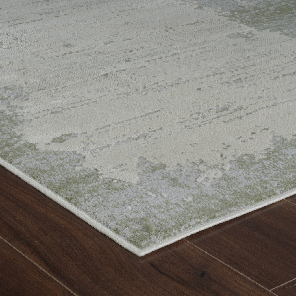 4' X 6' Beige and Green Abstract Distressed Area Rug