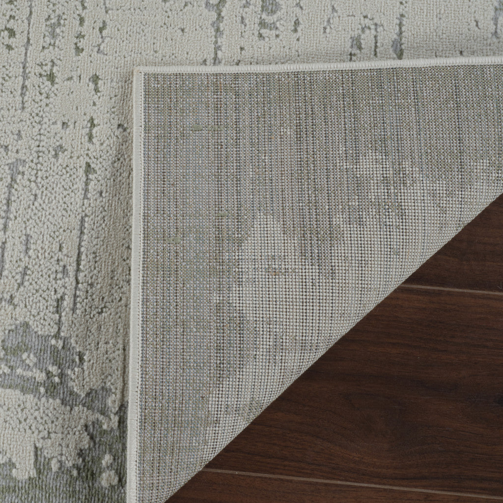 4' X 6' Beige and Green Abstract Distressed Area Rug