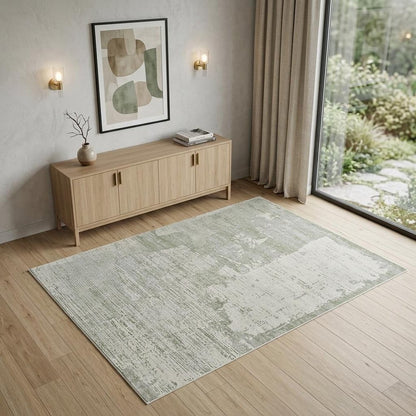 4' X 6' Beige and Green Abstract Distressed Area Rug