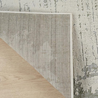 7' X 10' Beige and Green Abstract Distressed Area Rug