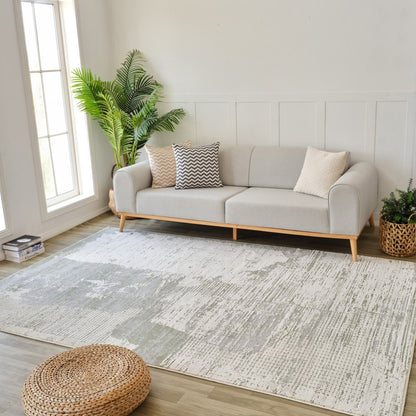 7' X 10' Beige and Green Abstract Distressed Area Rug