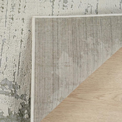 8' X 11' Beige and Green Abstract Distressed Area Rug