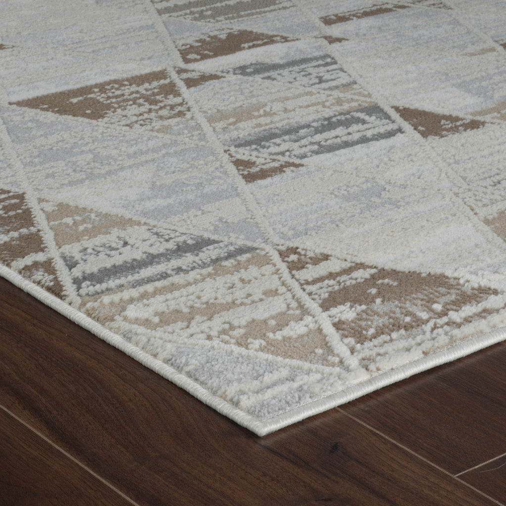 4' X 6' Beige and Brown Abstract Distressed Area Rug