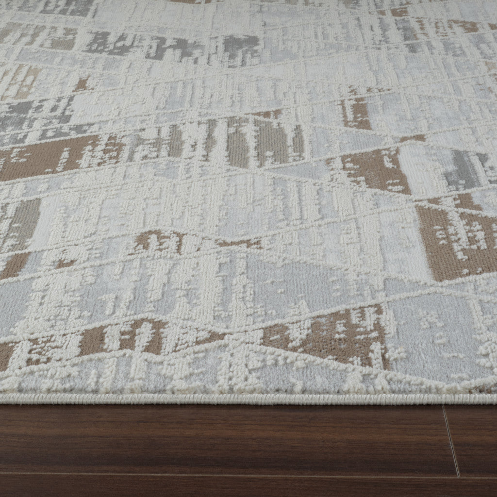 4' X 6' Beige and Brown Abstract Distressed Area Rug