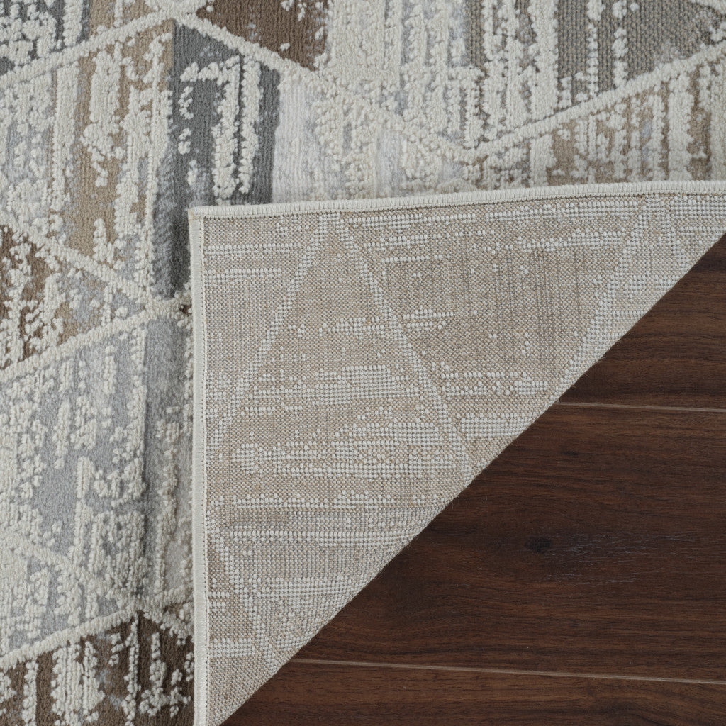 4' X 6' Beige and Brown Abstract Distressed Area Rug