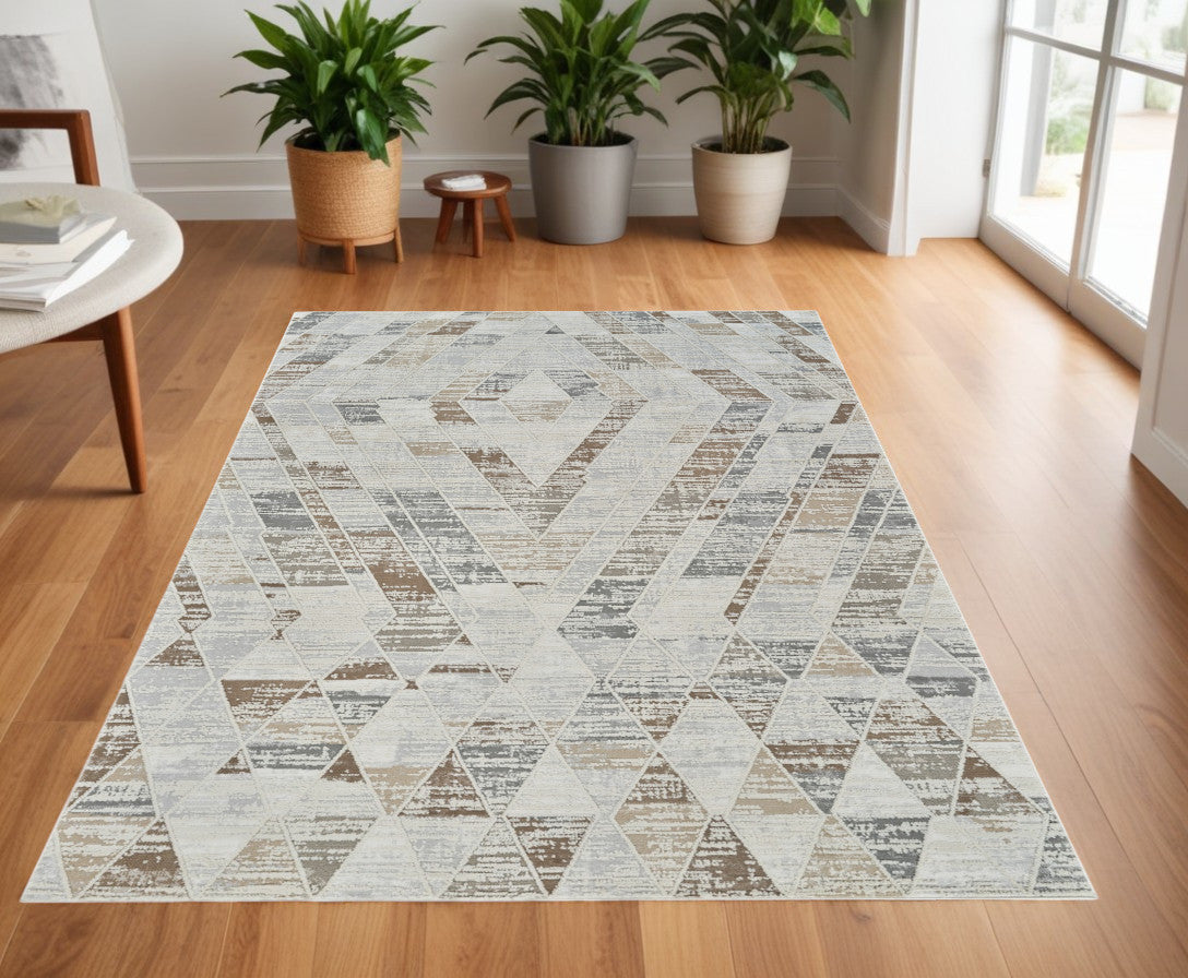 4' X 6' Beige and Brown Abstract Distressed Area Rug