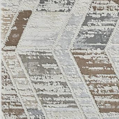 5' X 8' Beige and Brown Abstract Distressed Area Rug