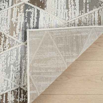 7' X 10' Beige and Brown Abstract Distressed Area Rug