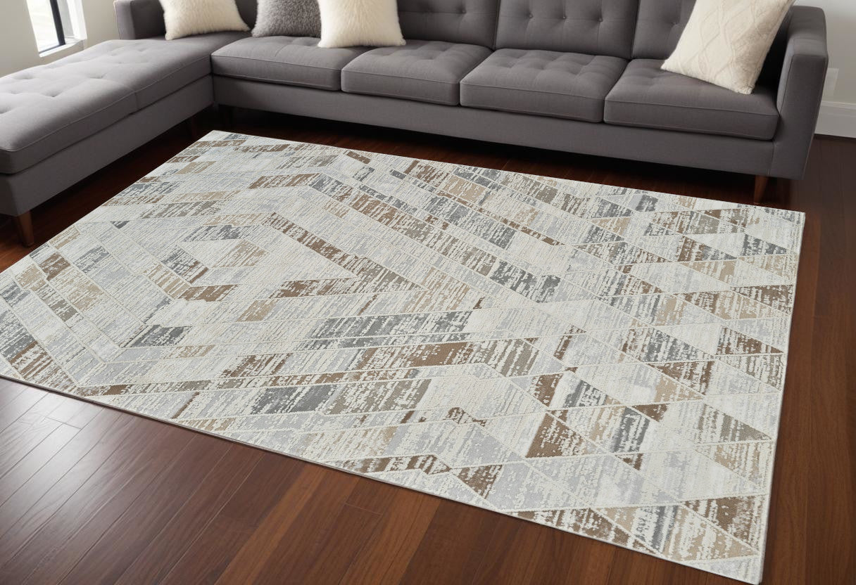 7' X 10' Beige and Brown Abstract Distressed Area Rug