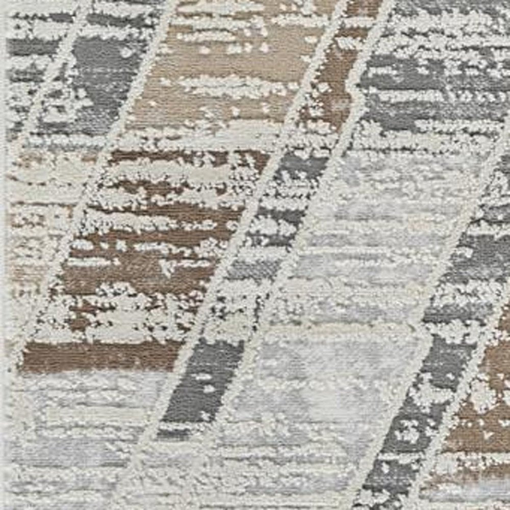 7' X 10' Beige and Brown Abstract Distressed Area Rug