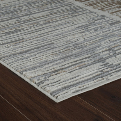 5' X 8' Beige and Brown Abstract Distressed Area Rug