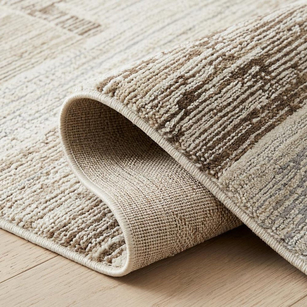 7' X 10' Beige and Brown Abstract Distressed Area Rug