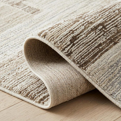 7' X 10' Beige and Brown Abstract Distressed Area Rug