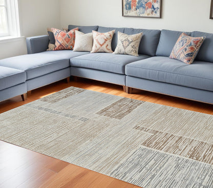 7' X 10' Beige and Brown Abstract Distressed Area Rug