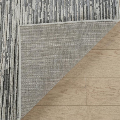 7' X 10' Beige and Brown Abstract Distressed Area Rug