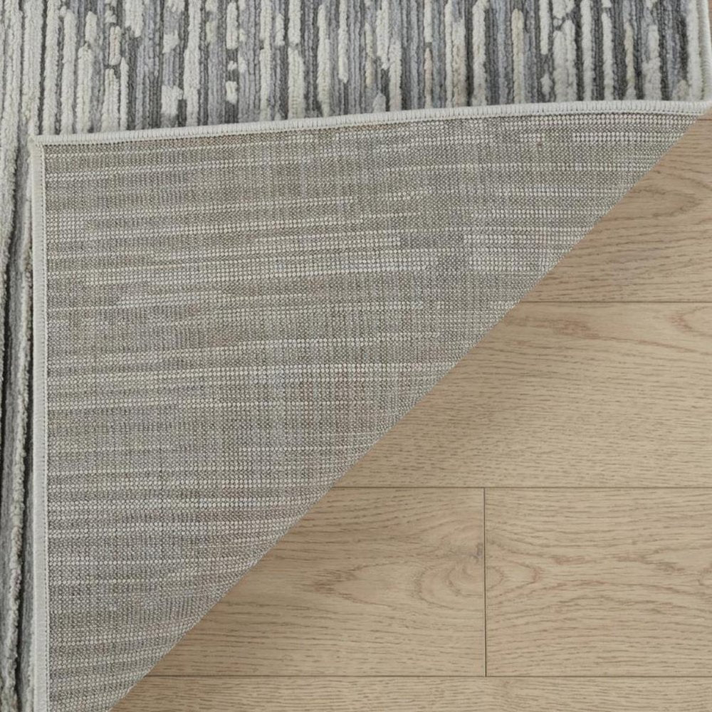 7' X 10' Beige and Brown Abstract Distressed Area Rug