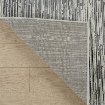 7' X 10' Beige and Brown Abstract Distressed Area Rug