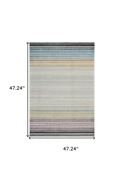 4' X 6' Beige and Blue Abstract Distressed Area Rug