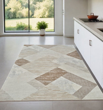 4' X 6' Beige and Brown Abstract Distressed Area Rug