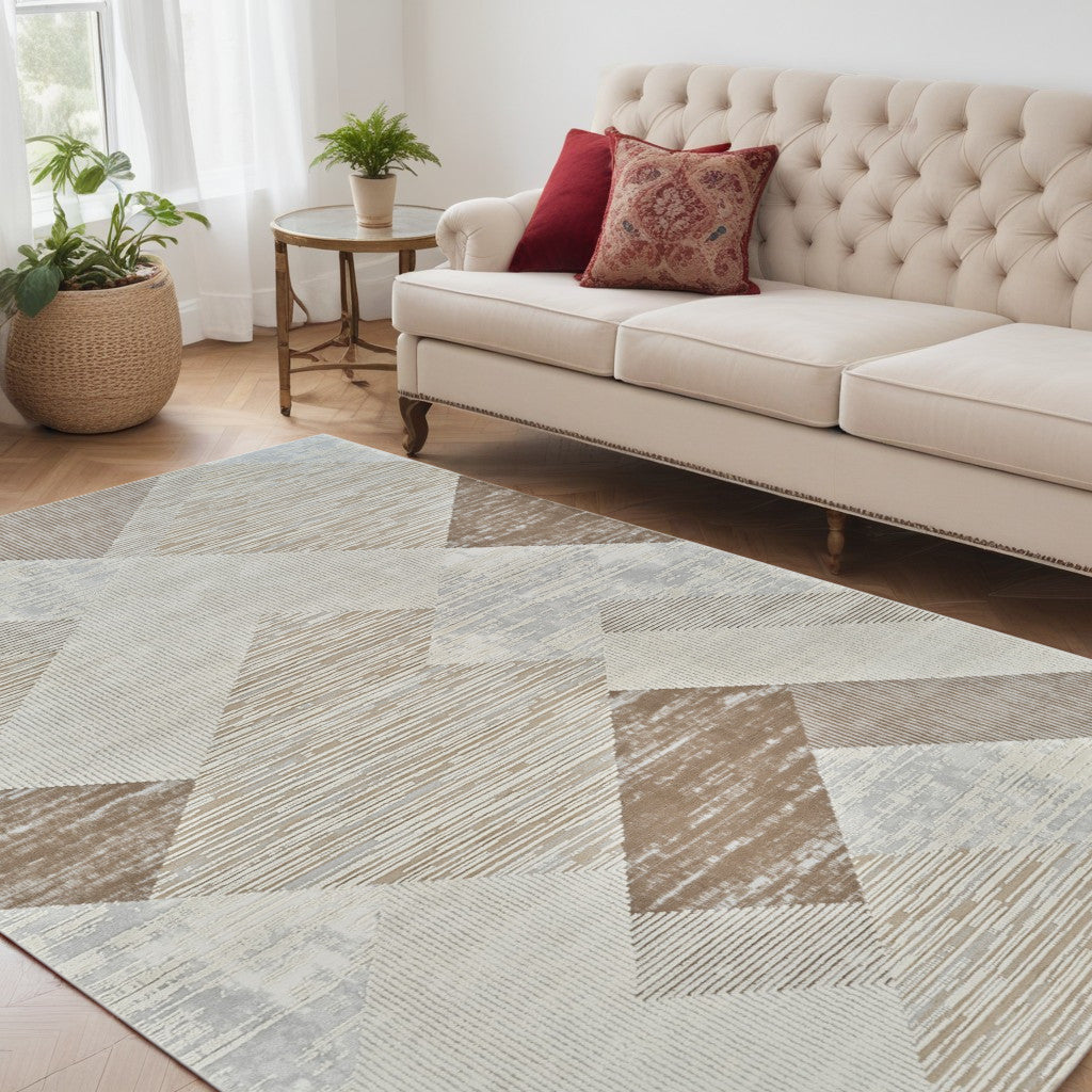 5' X 8' Beige and Brown Abstract Distressed Area Rug