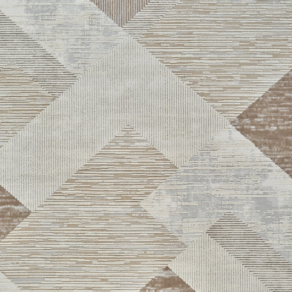 7' X 10' Beige and Brown Abstract Distressed Area Rug