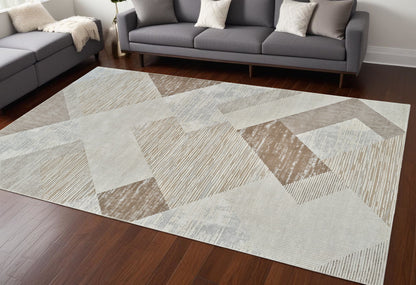 7' X 10' Beige and Brown Abstract Distressed Area Rug