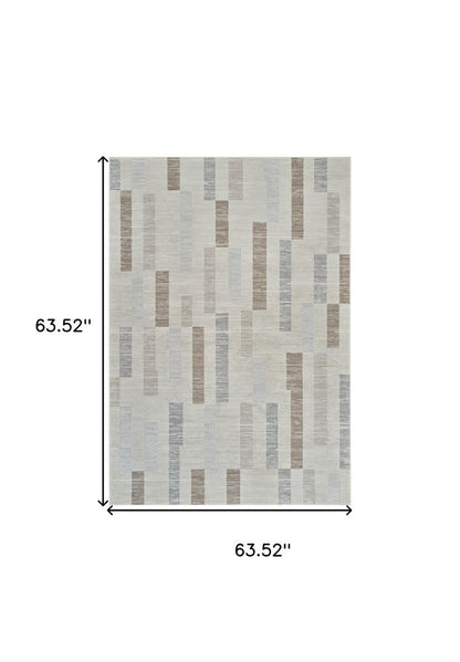 5' X 8' Beige and Brown Abstract Distressed Area Rug