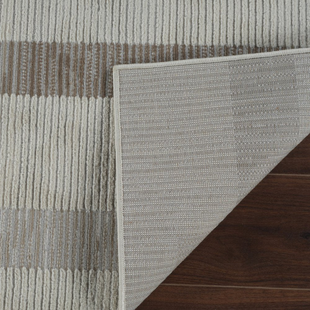 5' X 8' Beige and Brown Abstract Distressed Area Rug