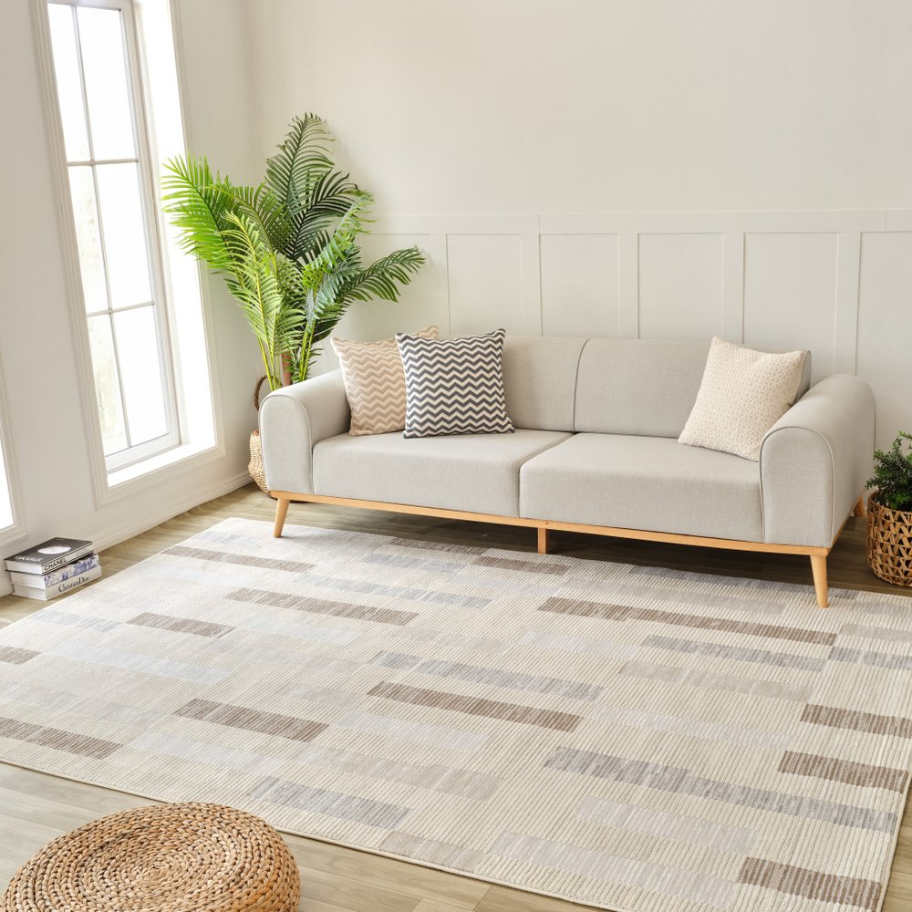 5' X 8' Beige and Brown Abstract Distressed Area Rug