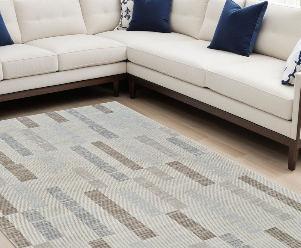 7' X 10' Beige and Brown Abstract Distressed Area Rug