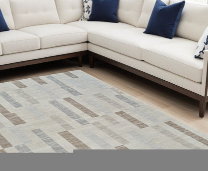 8' X 11' Beige and Brown Abstract Distressed Area Rug