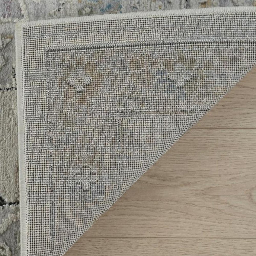 5' X 8' Cream and Beige Abstract Distressed Area Rug